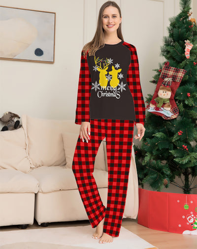 Two children in matching black and red buffalo plaid Christmas pajamas with golden deer and "Merry Christmas" print. - Image 11