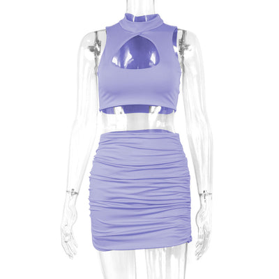 Light green two-piece set featuring a sleeveless crop top with a high neck and chest cutout, paired with a ruched bodycon mini skirt. - Image 8