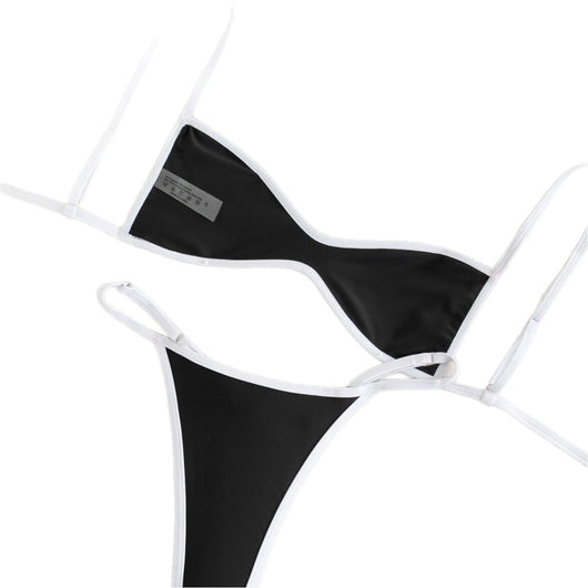 Black and white strapless bikini swimsuit set with adjustable straps and a ruched bottom, laid flat. - Image 5