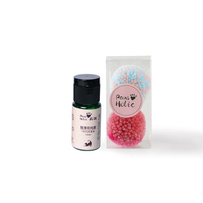 Two fluffy cat pom-pom toys, one pink and blue, one pink, in a clear box with a small bottle of catnip hydrosol. - Image 7