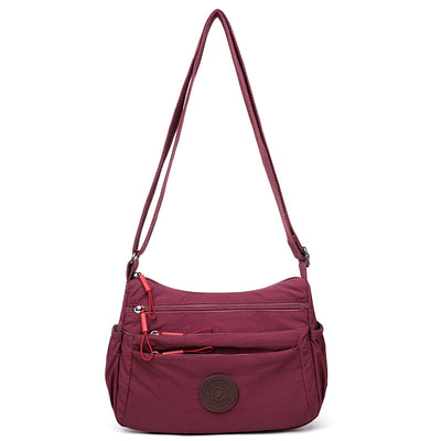 Bolsa Mensajera Casual Ligera Multicompartimento Diseño Simple - Image 8