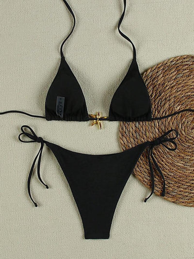 White women's bikini with triangle top and tie-side bottom, featuring a gold starfish charm on the center front. - Image 23