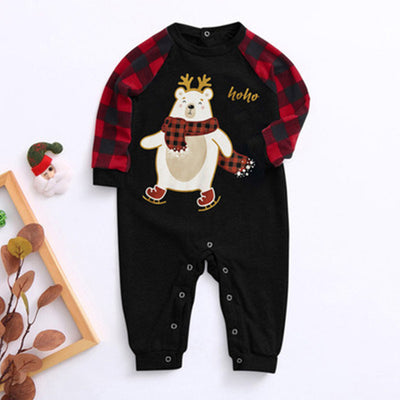 Kids' Christmas pajamas with a black long-sleeve top featuring a cartoon bear in a plaid scarf and ice skates, paired with red and black plaid pants. - Image 7