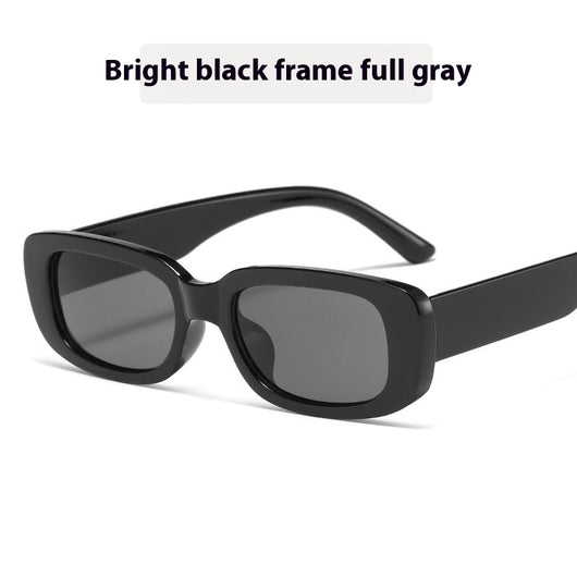 Children's small frame oval sunglasses with a solid white PC frame and brown AC lenses for UV protection. - Image 6