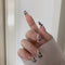 Manicura Estampado Leopardo con Perlas - Acabado Blanco Elegante