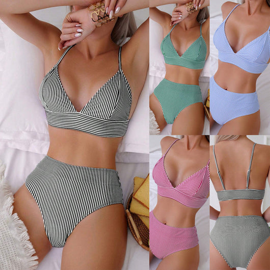 Green and white striped two-piece bikini with a triangle top and high-waisted bottoms on a woman.
