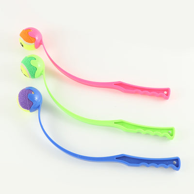 Pink pet throwing cue with a yellow and orange tennis ball, designed for outdoor dog training and play. - Image 10
