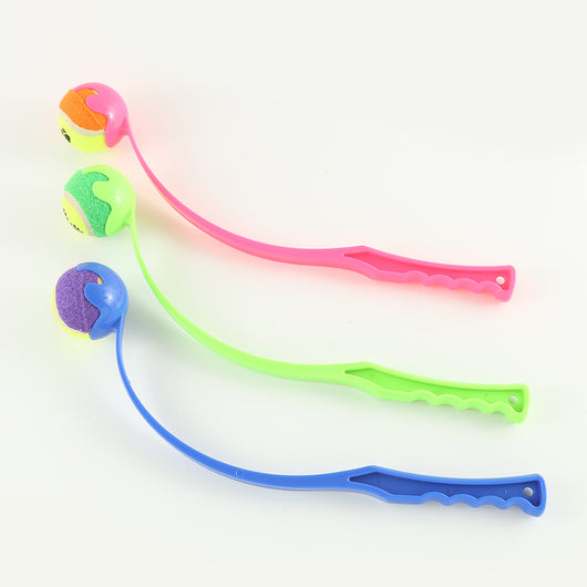 Pink pet throwing cue with a yellow and orange tennis ball, designed for outdoor dog training and play. - Image 10