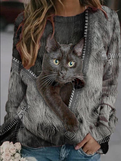 Gray long-sleeve t-shirt with a cartoon black cat peeking out of a printed zipper design, worn by a woman. - Image 8