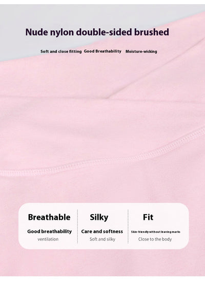 Light pink halter neck sports bra and high-waisted leggings workout set on a model. - Image 34