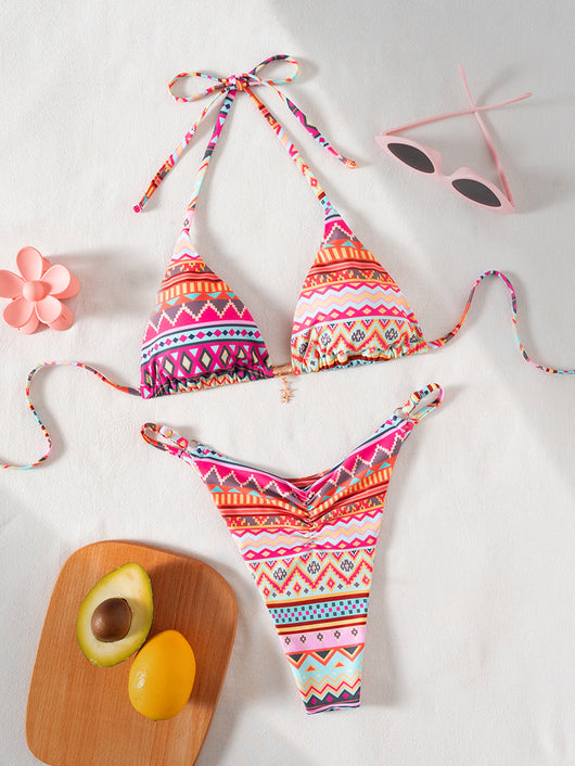 Vibrant geometric print triangle-bra bikini swimsuit with adjustable ties and high-cut ruched bottom. - Image 12