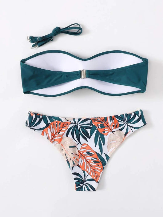 Blue bandeau bikini top with tropical leaf print high-cut bottom, styled with sandals, sunglasses, and a straw hat. - Image 14