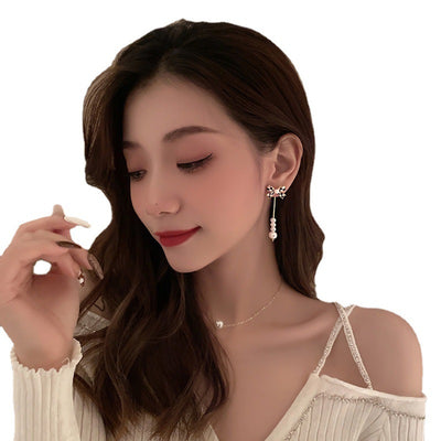 Aretes de Perla con Moño Elegante para Mujer - Image 6