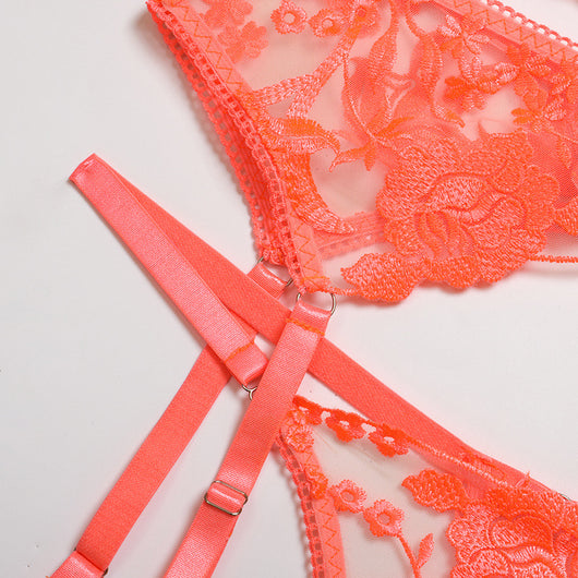 Purple embroidered lace three-piece lingerie set with underwire bra, thong, and garter belt on a white surface. - Image 13