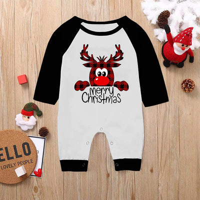 Family matching Christmas pajamas with a deer graphic and "Merry Christmas" text on white and black tops, paired with red and black buffalo plaid pants. - Image 10