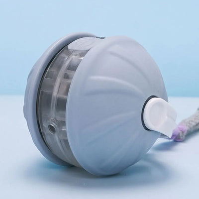 Light blue and white automatic rolling cat toy ball with a purple faux tail, featuring a power button. - Image 17
