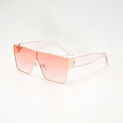 Oversized square sunglasses with a gold metal frame, dark gray lenses, and black plastic temples. - Image 9