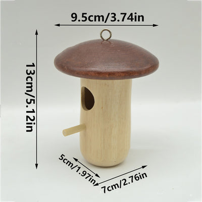 Wooden mushroom-shaped hummingbird feeder with a dark brown cap and light wood body, featuring an entrance hole and perch, held in a hand outdoors. - Image 8