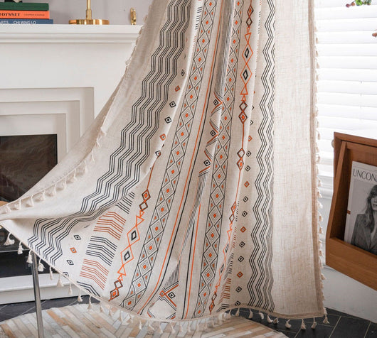Boho cream cotton and linen curtain with tribal print in black and orange, featuring black fringe tassels. - Image 3