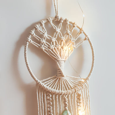 Handmade macrame dream catcher with a tree of life design, natural cotton rope, and a light green stone accent. - Image 9