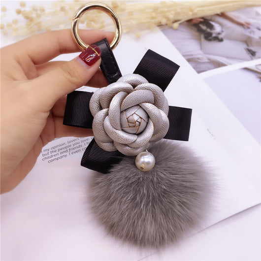 Llavero Decorativo Flor Camelia con Moño para Bolsa de Mujer - Image 5