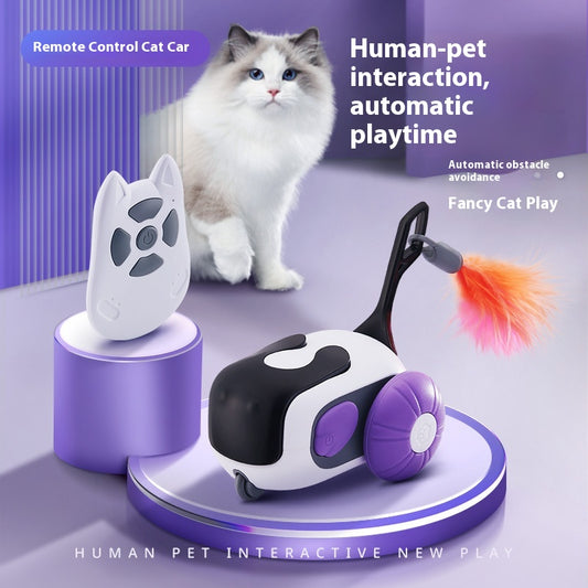 White and black remote control cat toy car with purple wheels and an orange feather, next to a white cat-shaped remote.
