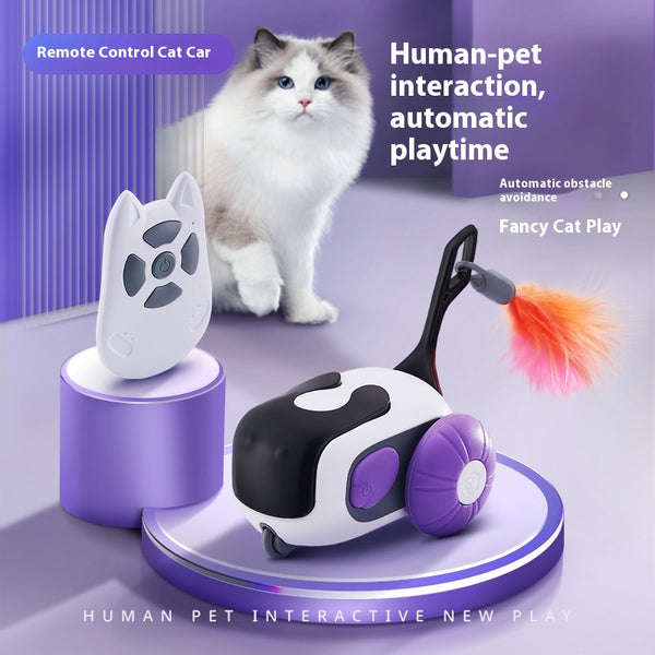 White and black remote control cat toy car with purple wheels and an orange feather, next to a white cat-shaped remote.