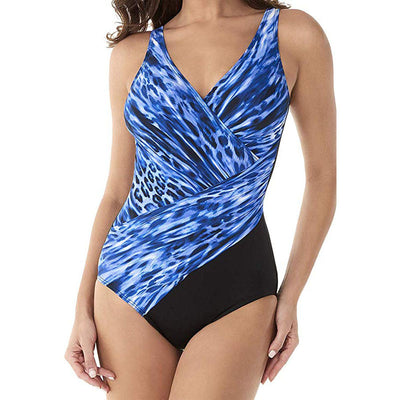 Plus size one-piece swimsuit with a blue, black, and white abstract print top and solid black bottom, featuring a wrap-front V-neck. - Image 6