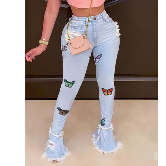 Pantalones Vaqueros Azules con Mariposas Bordadas y Detalles Rotos