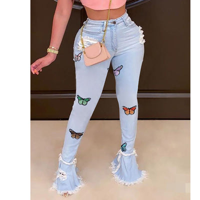 Pantalones Vaqueros Azules con Mariposas Bordadas y Detalles Rotos
