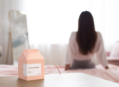 Pink milk carton shaped humidifier with a white label, featuring "Milkbox Humidifier" text and a bcase logo. - Image 12