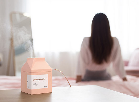Pink milk carton shaped humidifier with a white label, featuring "Milkbox Humidifier" text and a bcase logo. - Image 12