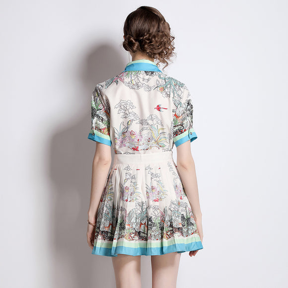 Conjunto de Blusa Estampada y Falda Plisada