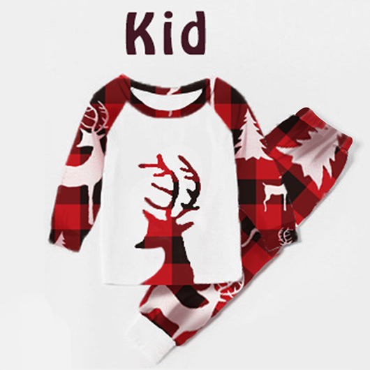 Women's Christmas pajama set with white raglan top featuring a red plaid deer head and matching red plaid pants with deer and trees. - Image 11
