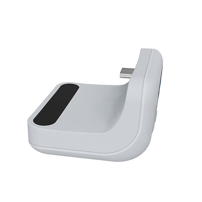 White portable battery pack with digital display attached to a PS5 controller, showing 100% charge. - Image 7