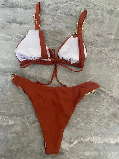 Dark brown bandeau bikini with a gold ring detail on the top and matching side-tie bottoms with gold rings. - Image 8