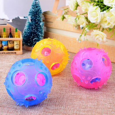Three translucent hollow toy balls in pink, blue, and yellow, with textured surfaces and internal components. - Image 5