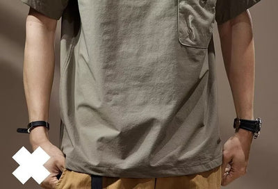 Men's khaki short-sleeve polo shirt with a lapel collar, three buttons, and a large flap chest pocket with a D-ring. - Image 15