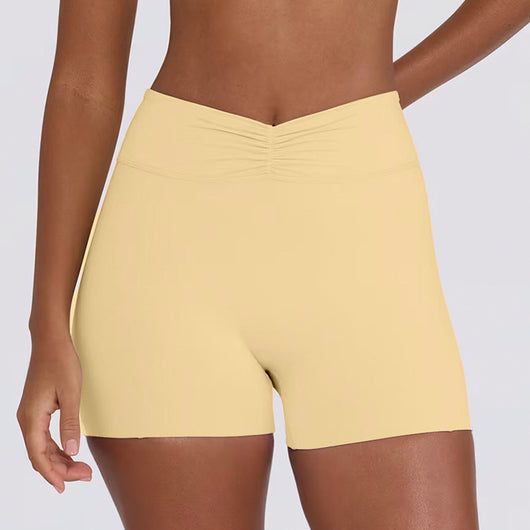 Light pink halter neck sports bra and high-waisted leggings workout set on a model. - Image 22