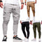 Pantalones Deportivos Hombre con Bolsillos Múltiples y Puños Ajustables