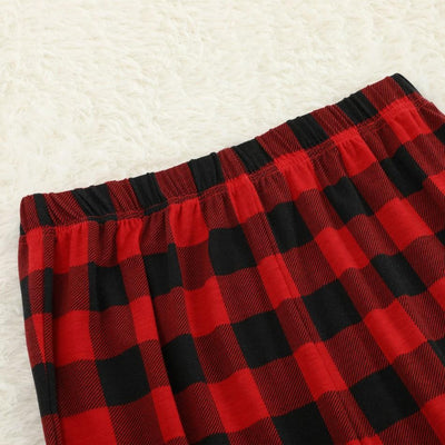 Family Christmas pajama set with grey long-sleeve tops featuring "Merry Christmas" and reindeer antlers, paired with red and black buffalo plaid pants. - Image 14