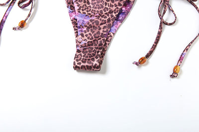 Three-piece bikini set with a brown leopard and pink floral print halter top, matching bottom, and ruched mini skirt. - Image 27