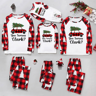 Matching family Christmas pajamas with red and black plaid, white trees, reindeer, and 'LOVE' with a gnome and leopard print. - Image 3
