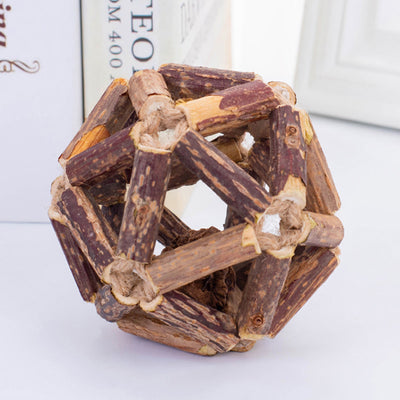 Natural catnip ball toy with a geometric cage made of dark and light brown wooden sticks for cats. - Image 8