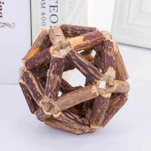 Natural catnip ball toy with a geometric cage made of dark and light brown wooden sticks for cats. - Image 8