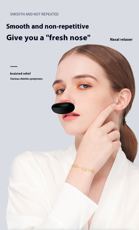 Black intelligent infrared nasal relief device with two translucent nasal probes, shown at an angle. - Image 12