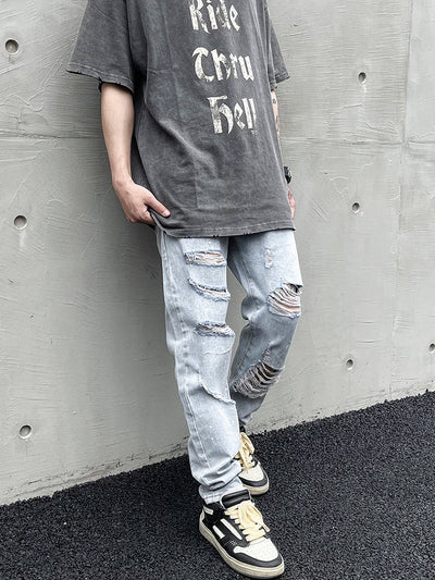 Jeans Slim Fit Desgastado con Roturas Estratégicas y Efecto Tinta - Image 6