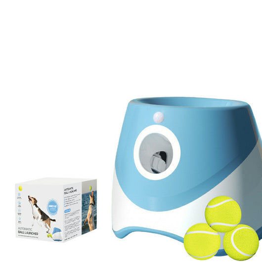 Two automatic dog ball throwers, one yellow and white, one green and white, on a wooden desk. - Image 8