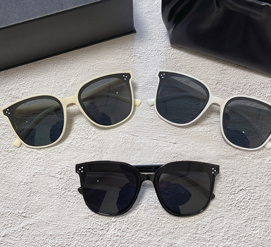Cream square-style sunglasses with dark lenses, featuring small silver accents on the frame corners. - Image 17