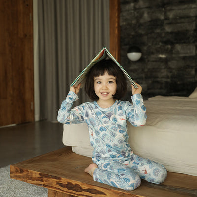 Bamboo cotton knitted parent-child pajama set with a pumpkin print long-sleeve top and solid light blue-grey pants. - Image 3